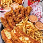 Raising Cane's Heads to the Strip