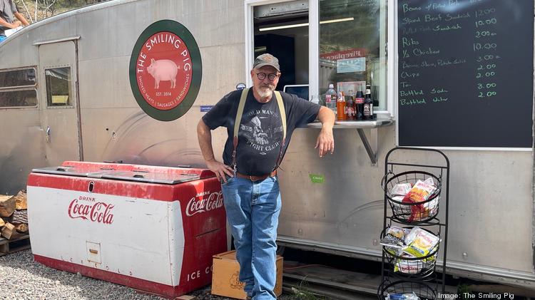 The Smiling Pig owner Tim Gregg outside of his food truck in Bailey.