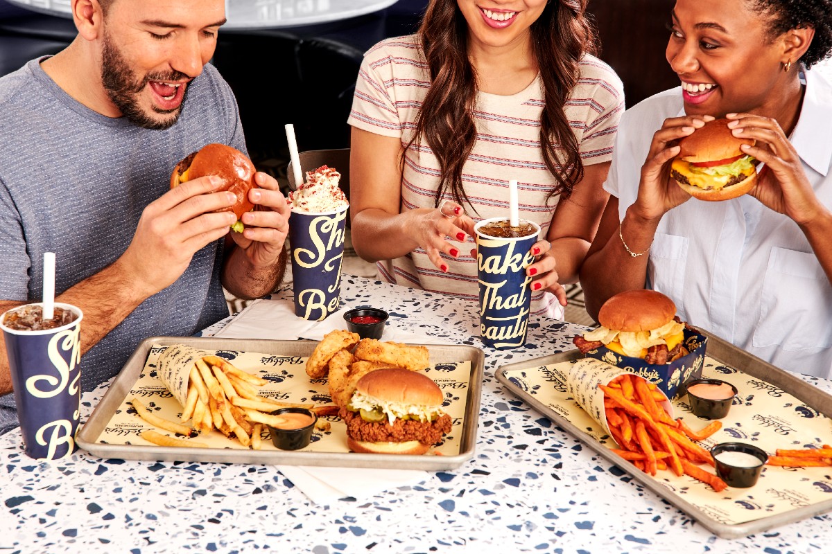 Eaters enjoying a meal at Bobby's Burgers.