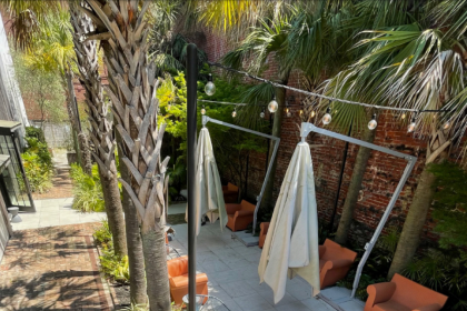 an outdoor patio at 492 king street in charleston south carolina which will be renovated for a new pasta beach restaurant