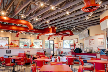 The red vintage diner themed interior of a freddy's that opened in summerville in 2021