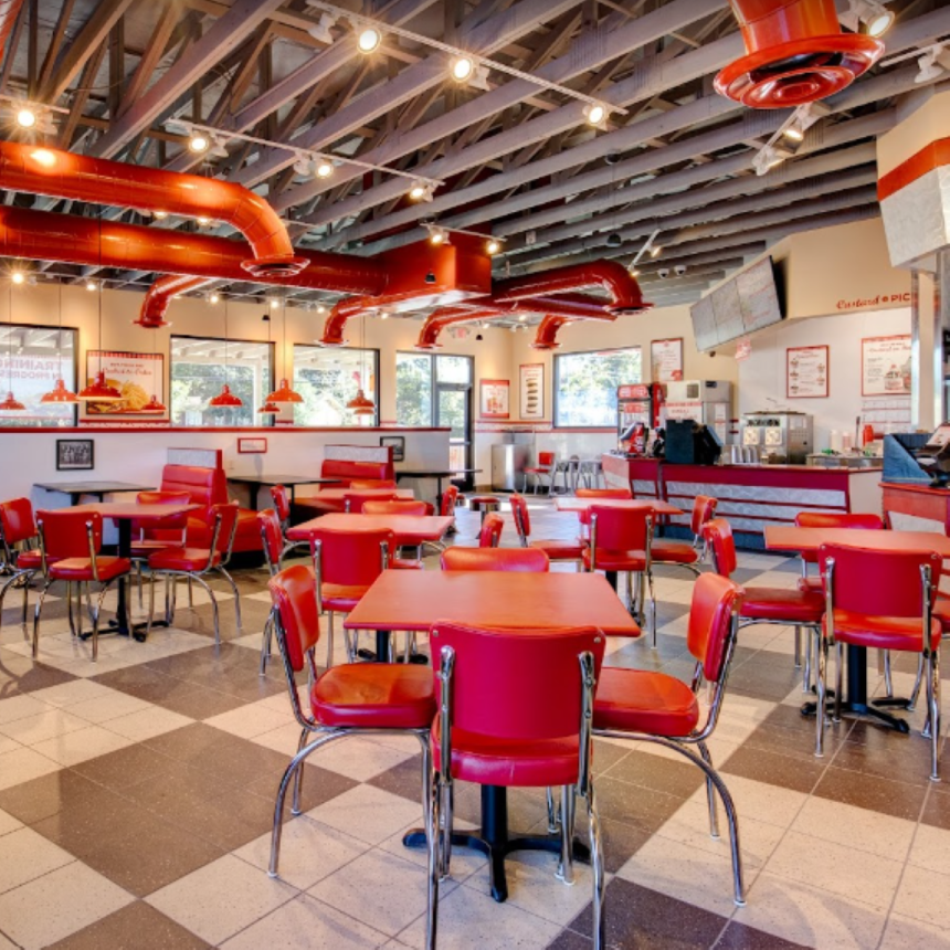 The red vintage diner themed interior of a freddy's that opened in summerville in 2021