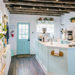 The interior of the original sightsee coffee and retail shop in downtown charleston, with a coffee service counter and items for sale on the walls