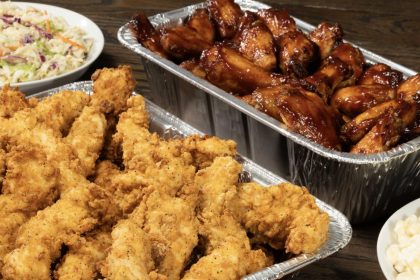 A tray of slim chickens tenders and wings along with sauces that will be served at the new Moncks Corner location of the restaurant near Charleston