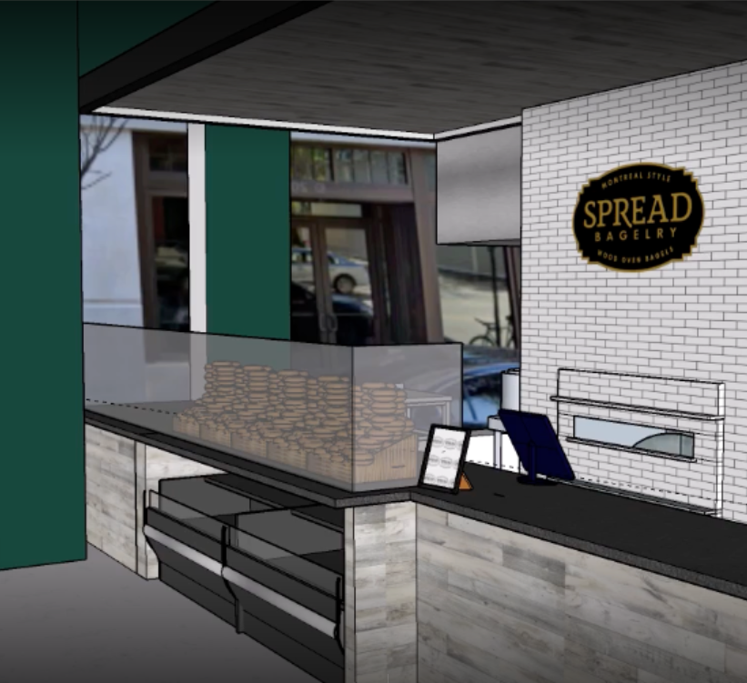 A rendering of a counter at the future Spread Bagelry, with the logo on the wall behind a cash register