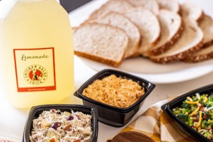 chicken salad and pimiento cheese with wheat bread and lemonade as served at chicken salad chick franchise locations