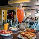 roosters breakfast and mimosas interior sacramento expansion