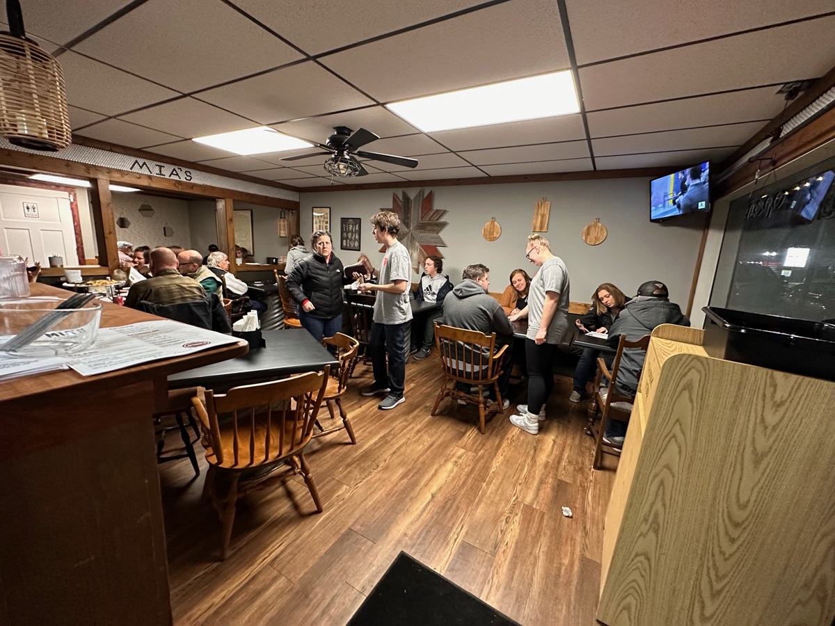 mia's village eats interior serving