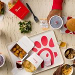 Chick-fil-A is opening at Firestone for the first time this October with grand celebrations and free entrees for guests in cow attire.