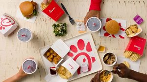 Chick-fil-A is opening at Firestone for the first time this October with grand celebrations and free entrees for guests in cow attire.