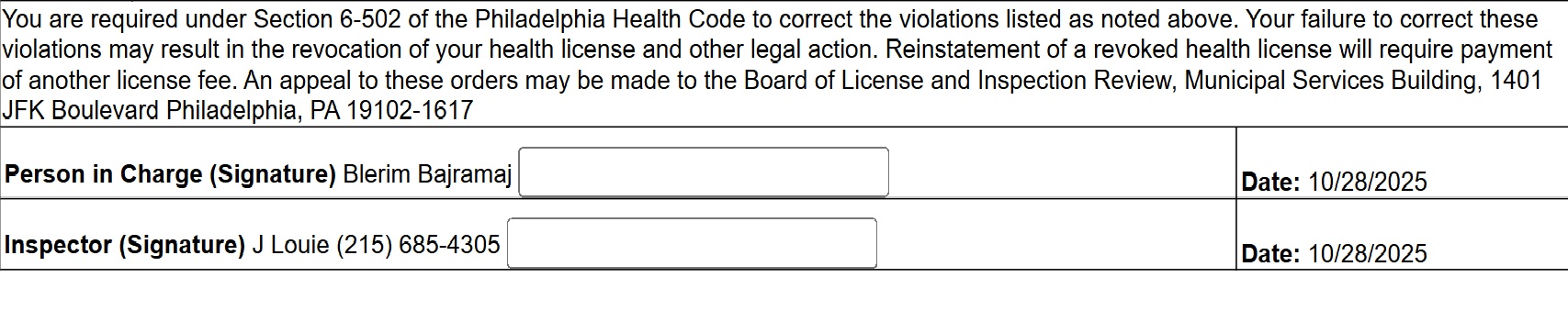 Boxes of single-use paper products were found stored under a sewer pipe and drain basin.