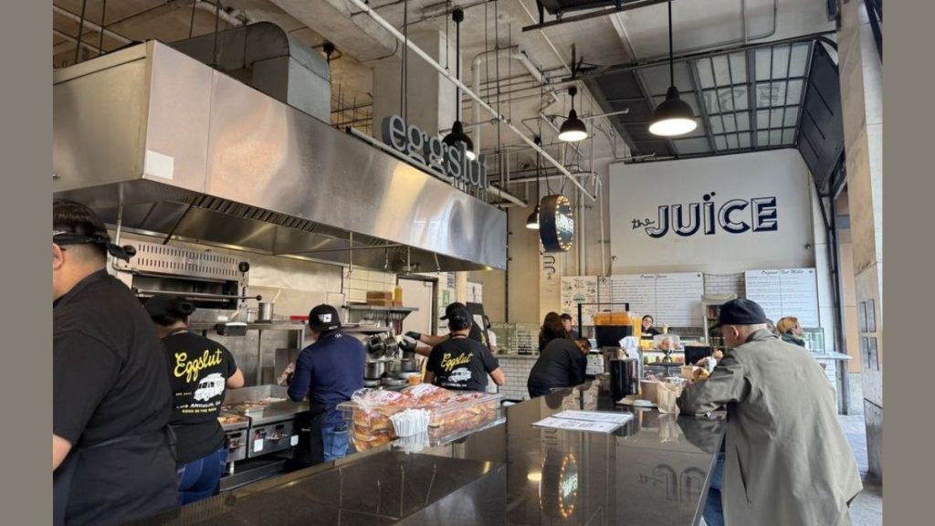 A view of the open kitchen counter at one of the locations of Eggslut