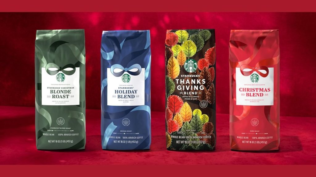 Image of 4 different whole bean coffee packs by Starbucks