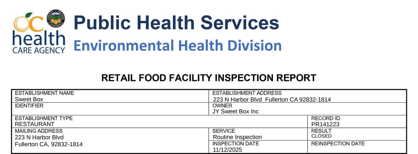 Raw shell eggs were found stored above ready-to-eat macaroons in the walk-in cooler, creating a contamination risk.