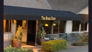The Brass Door storefront