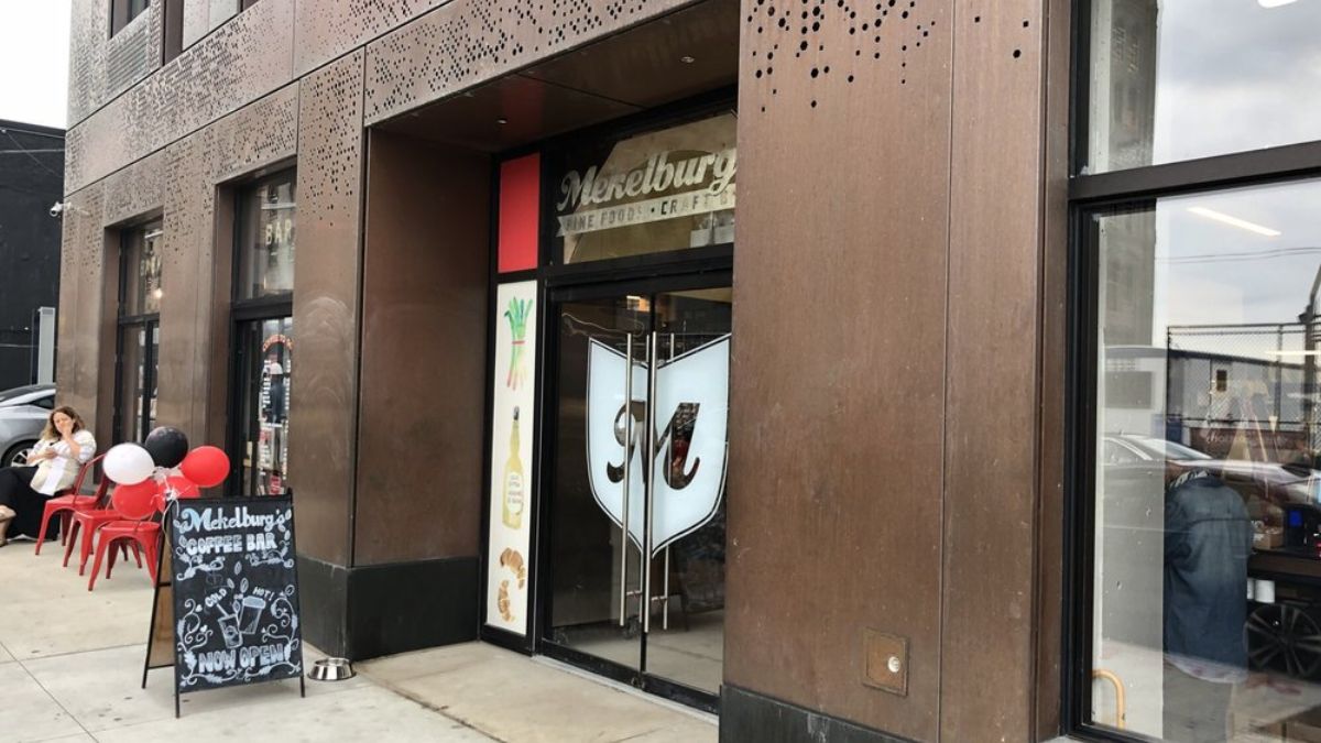 The space brings together multiple facilities, like a gourmet grocery, cafe, bar, and restaurant in one location