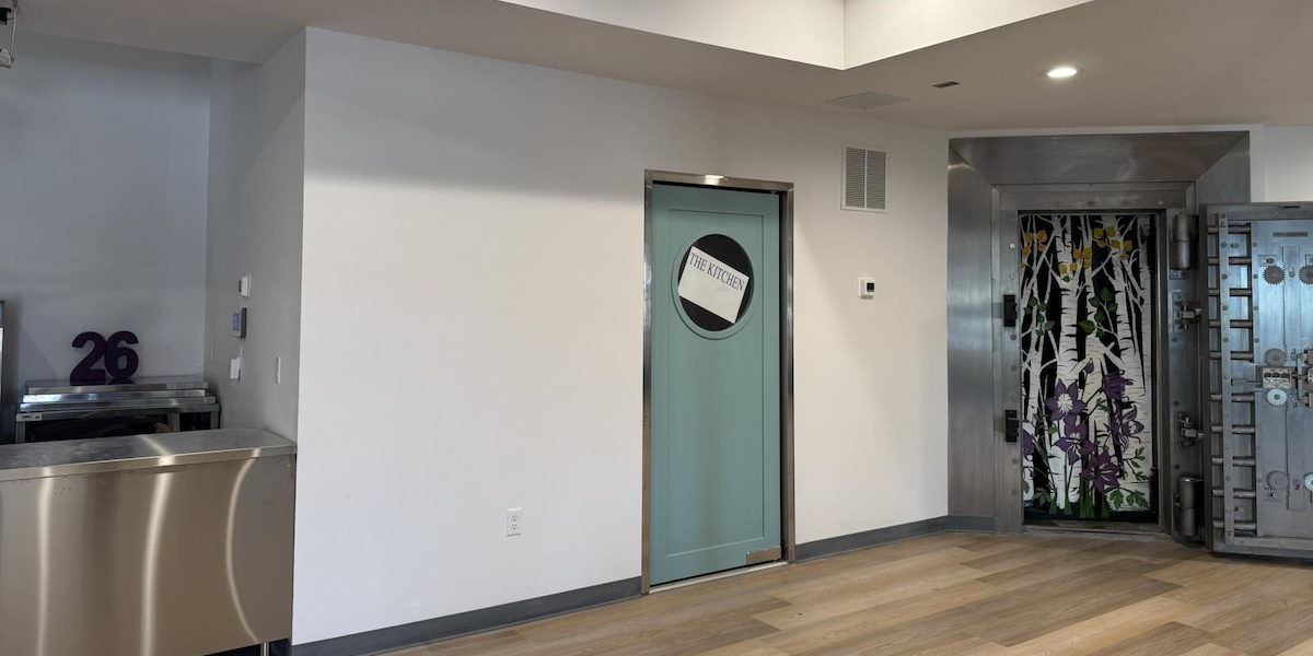 Interior of The Kitchen at The Vault, featuring a large walk-in vault