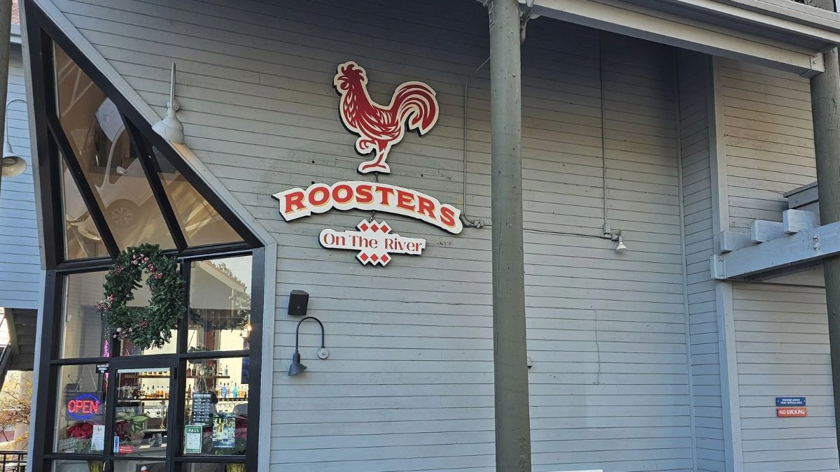 Roosters on the River front image