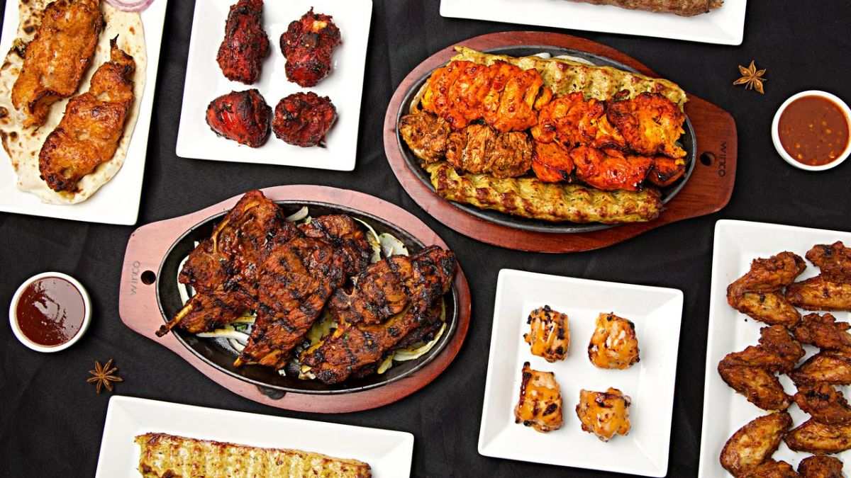 Overhead image of food table with dishes from Aga’s menu (Courtesy of Aga’s Restaurant & Catering)