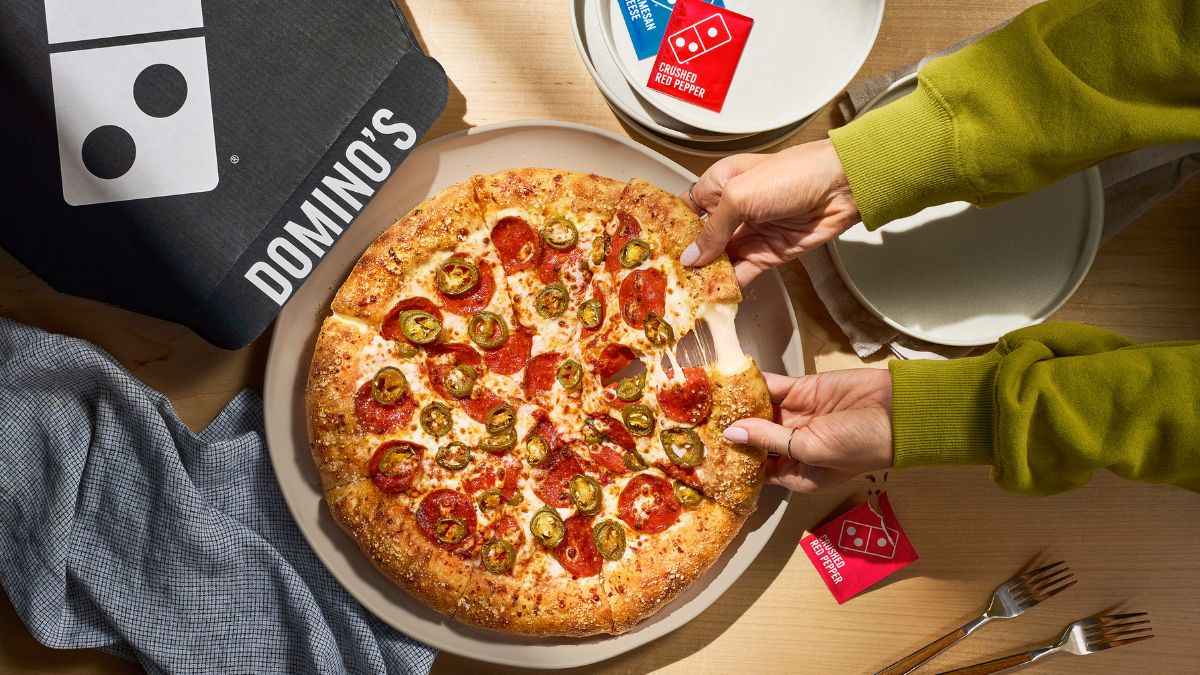 This image shows the Parmesan Stuffed Crust offering by Domino’s