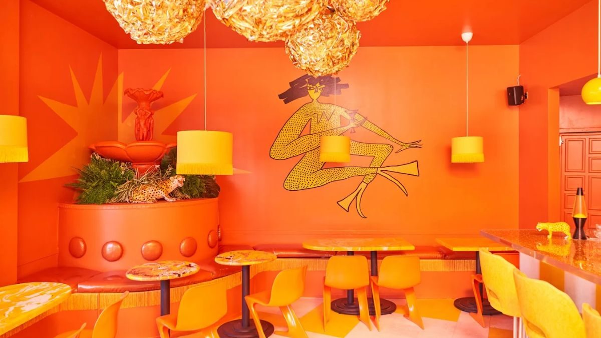Shuggie’s Inside the neon colored, bright and bold Shuggie’s restaurant (Google Photos by Shuggie’s)