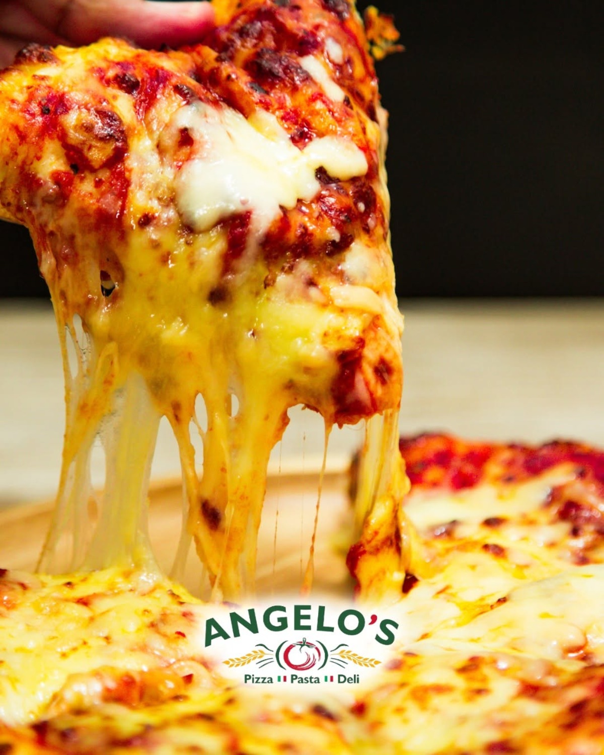 Angelo’s Pizza Pasta and Deli Slicing into Olney