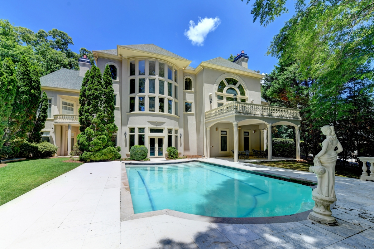 European-Inspired Architecture on a Private Wooded Estate